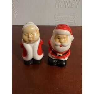 Christmas House Salt/Pepper Shakers Mr & Mrs Claus Kissing & Hiding Gifts